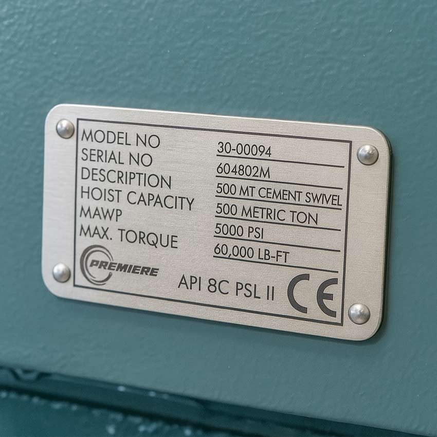 Laser engraved serial number plates on machinery